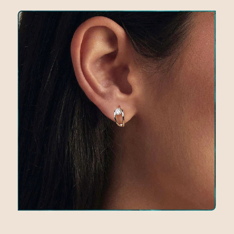 Double-Row Moissanite Huggie Hoop Earrings in Silver — Worn on ear