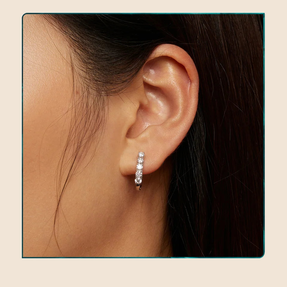 Five-Stone U-Shaped Moissanite Hoop Earrings in Silver - Hoop earrings shown on model