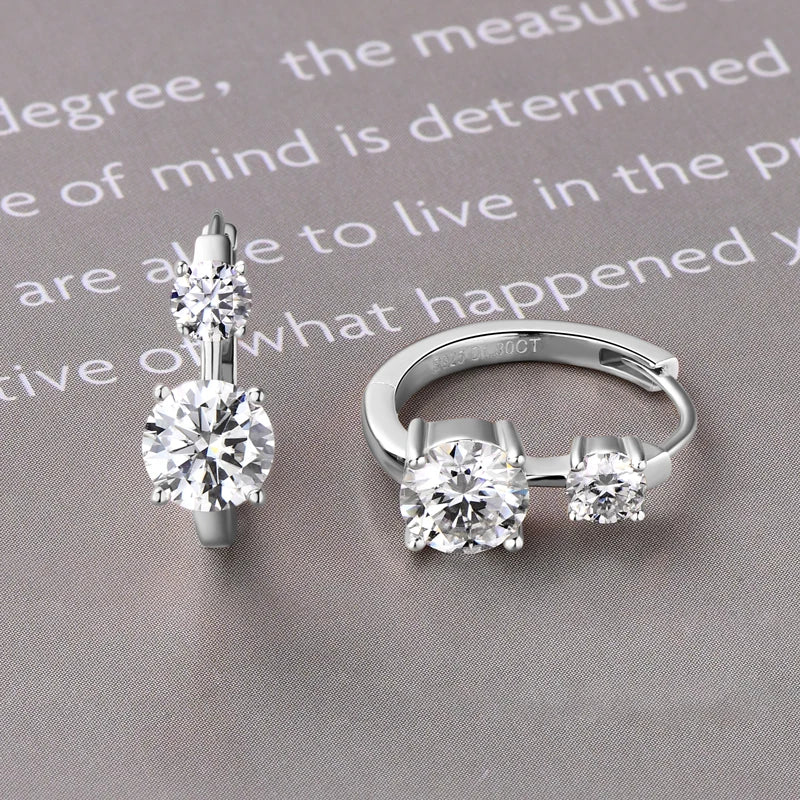Graduated Two-Stone Moissanite Hoop Earrings in Sterling Silver — Silver stone setting detail