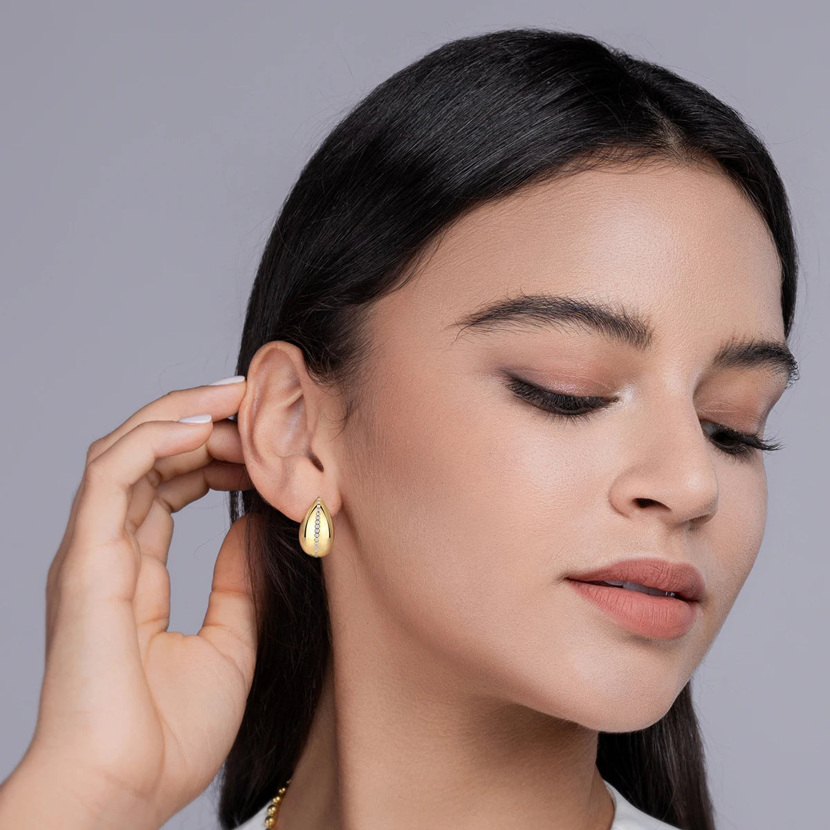 Gold-Plated Teardrop Moissanite Accent Stud Earrings — Studs worn