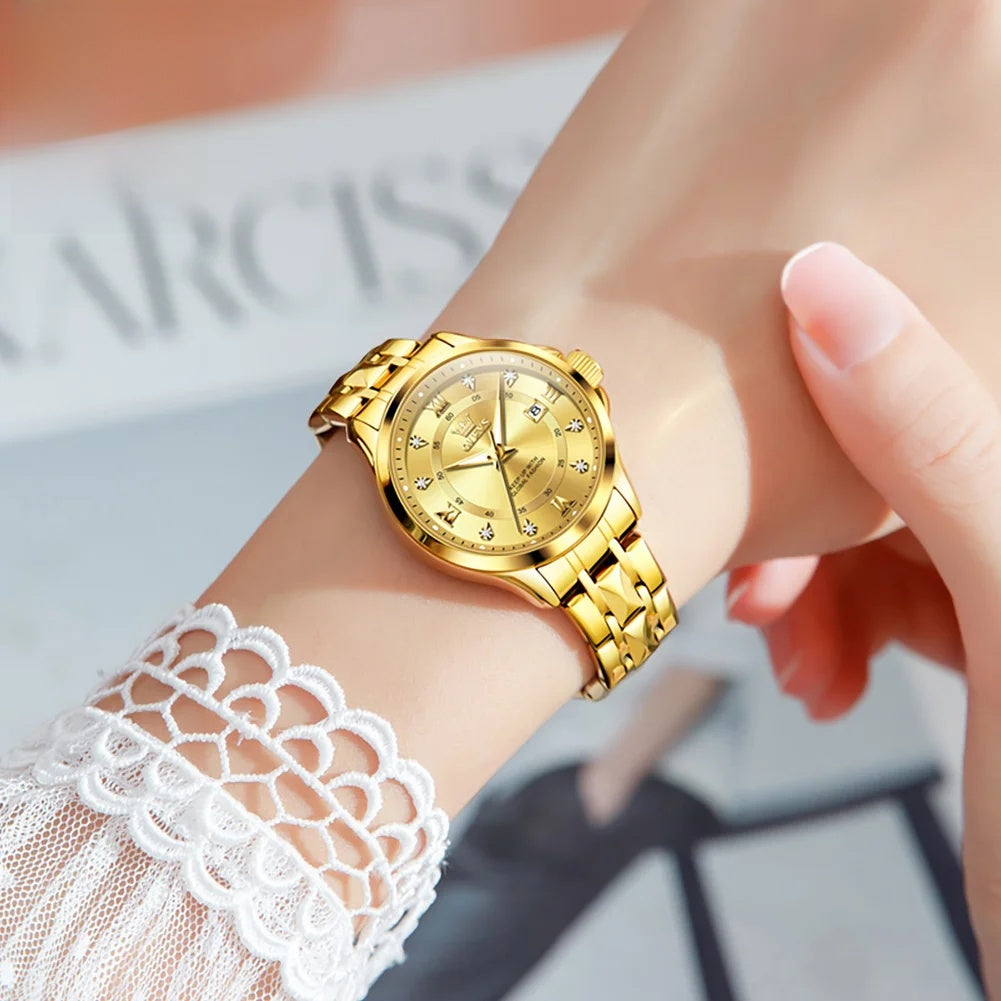 Women's 30mm Bracelet Watch with Date — Gold-tone watch worn on wrist