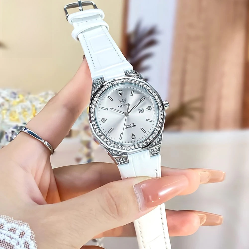 Women's Crystal Bezel Leather Date Watch — White leather watch held in hand — BandsCo Straps