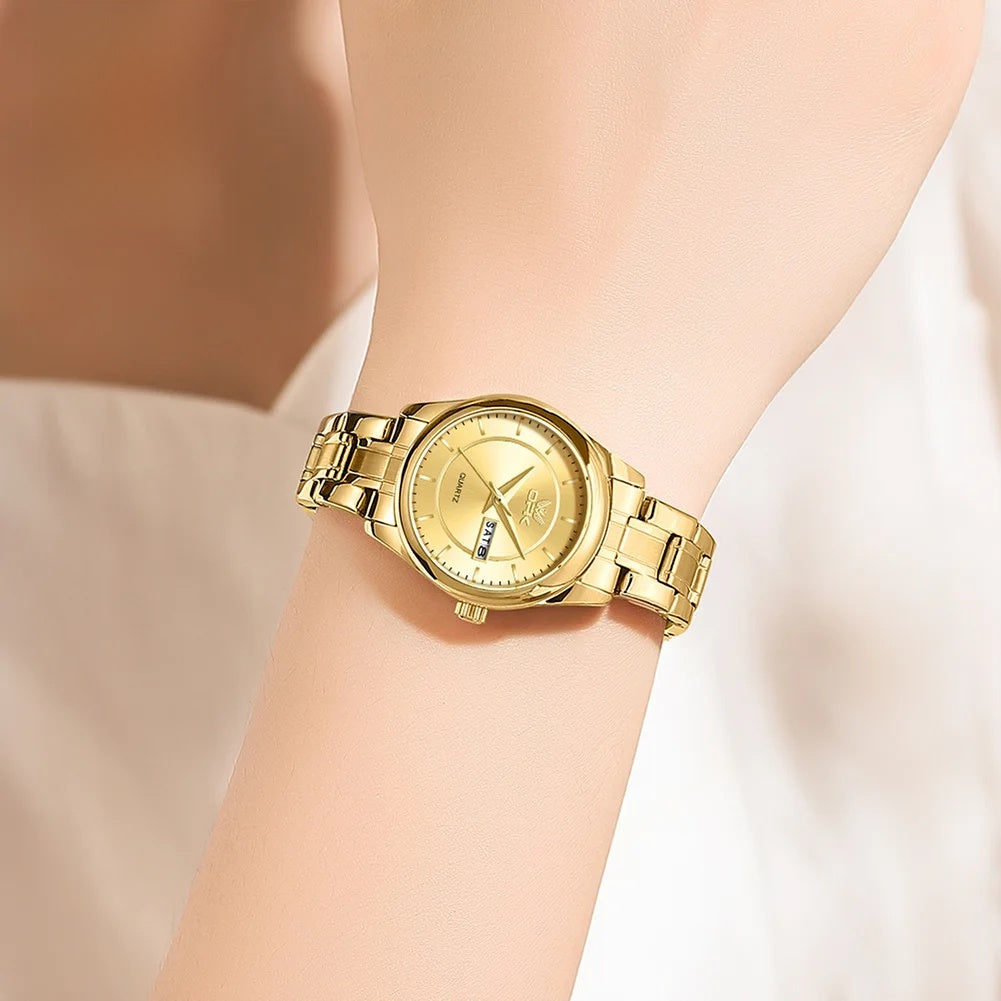 Women's Stainless Steel Day-Date Quartz Watch — Gold-tone watch worn on wrist — BandsCo Straps