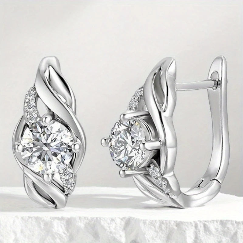 Twist-Frame Moissanite Leverback Earrings in Sterling Silver - Silver pair close-up