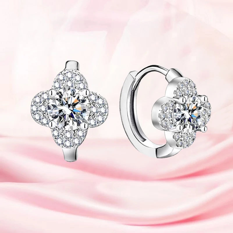 Clover Halo Moissanite Hoop Earrings in 925 Sterling Silver — Pair on pink fabric
