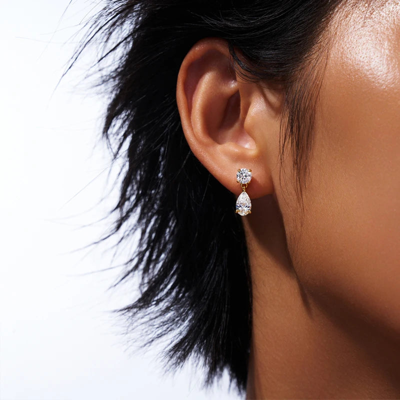 Round & Pear Moissanite Drop Earrings in Sterling Silver - Drop earrings shown on model