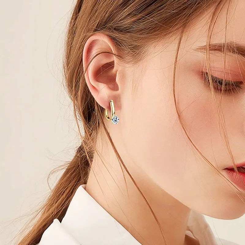 Solitaire Moissanite Leverback Hoop Earrings in Sterling Silver — Shown on ear