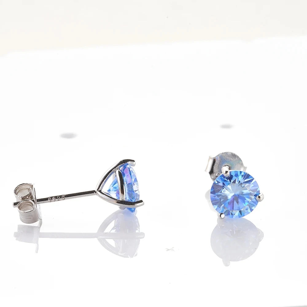 Colored Three-Prong Moissanite Stud Earrings in Sterling Silver — Blue side view