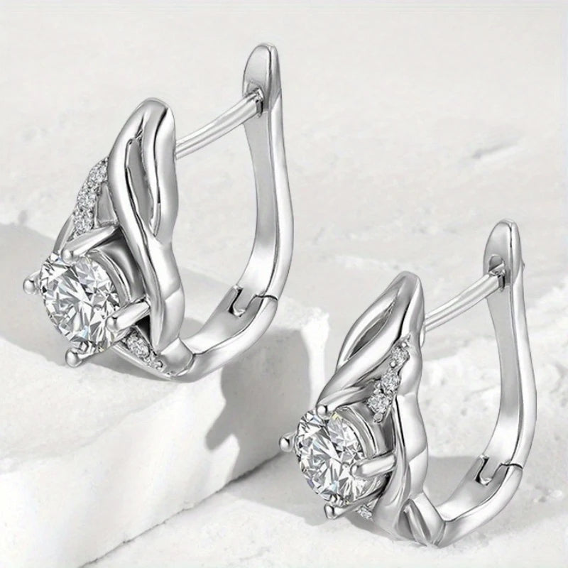 Twist-Frame Moissanite Leverback Earrings in Sterling Silver - Silver leverbacks angled view
