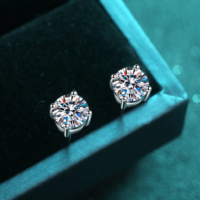 Colored Four-Prong Moissanite Stud Earrings in Sterling Silver — White angled pair