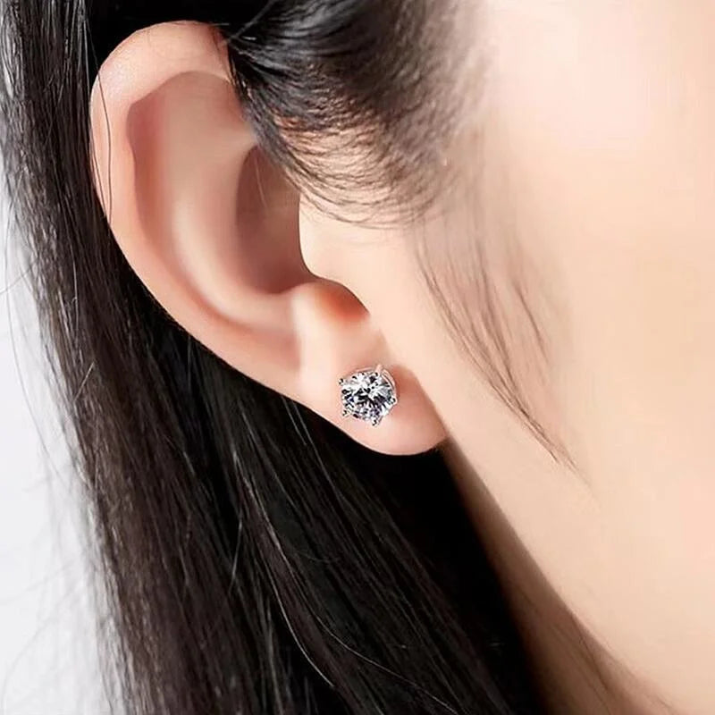 Colored Six-Prong Moissanite Stud Earrings in Sterling Silver — White stones shown on ear