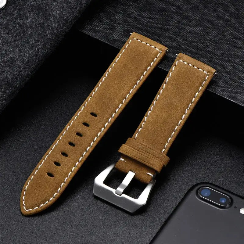 Tan leather strap with contrasting stitches