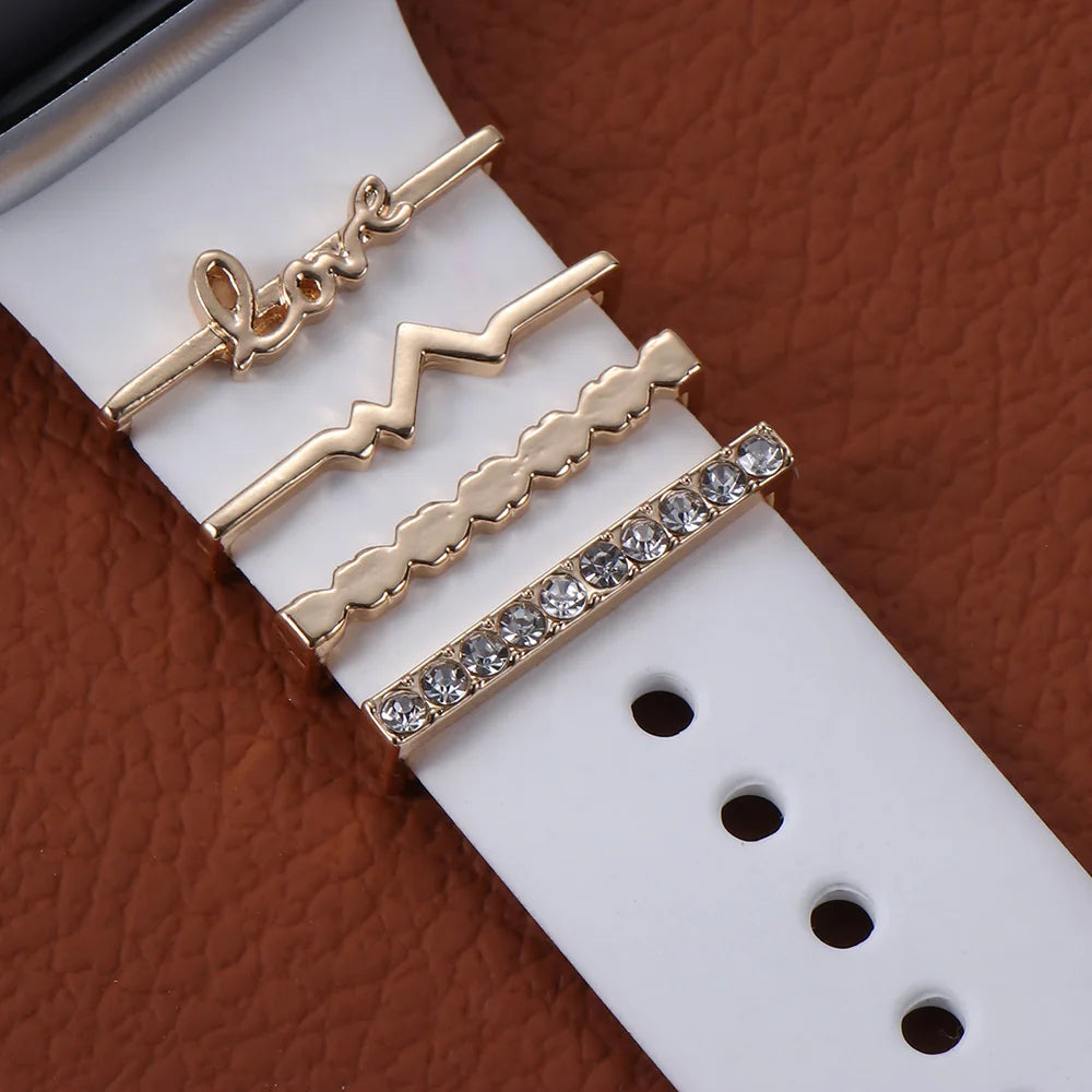 Decorative metal charms for Apple Watch bands, featuring stylish designs and rhinestone accents.
