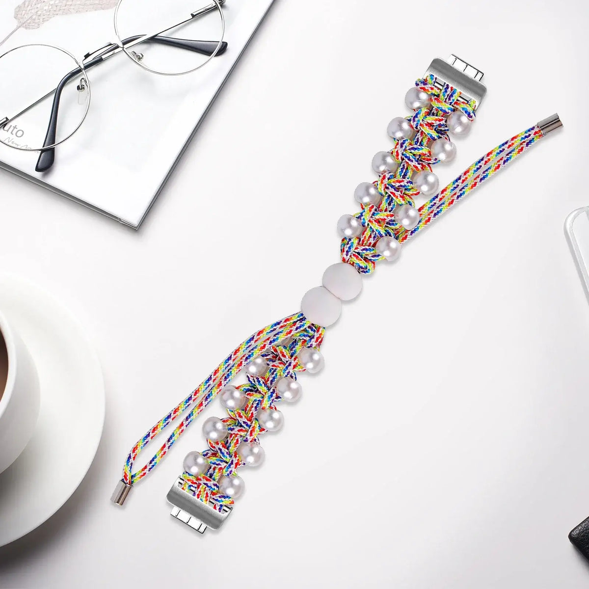 Fitbit Inspire Braided Cord & Pearl-Style Bead Band - Rainbow strap laid flat