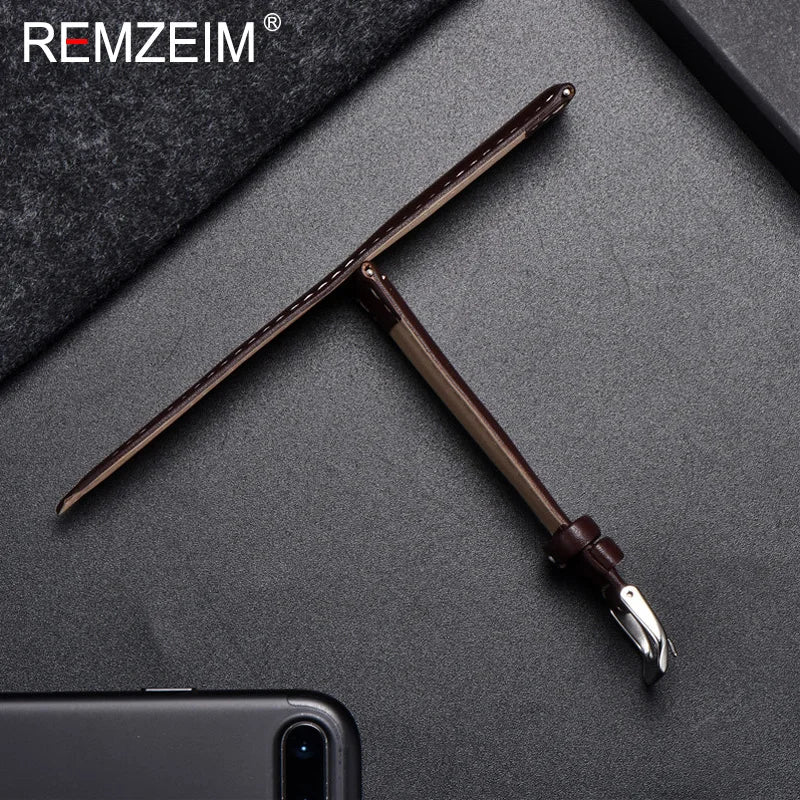OnePlus Leather Watch Band, Soft Calfskin Strap with Silver Buckle displayed on a black surface.