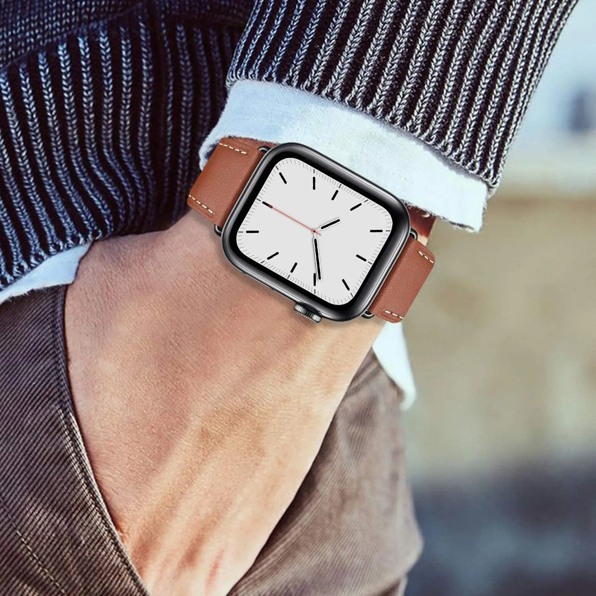 Tan fabric strap worn with a sweater for Apple Watch