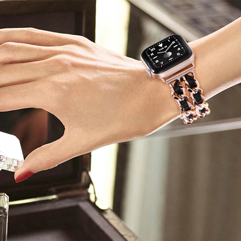 Chain bracelet with black accents worn on a wrist for Apple Watch