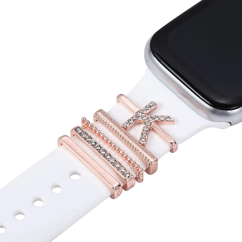 Elegant decorative metal charm 'K' for Apple Watch bands, featuring rhinestones and a stylish rose gold finish.