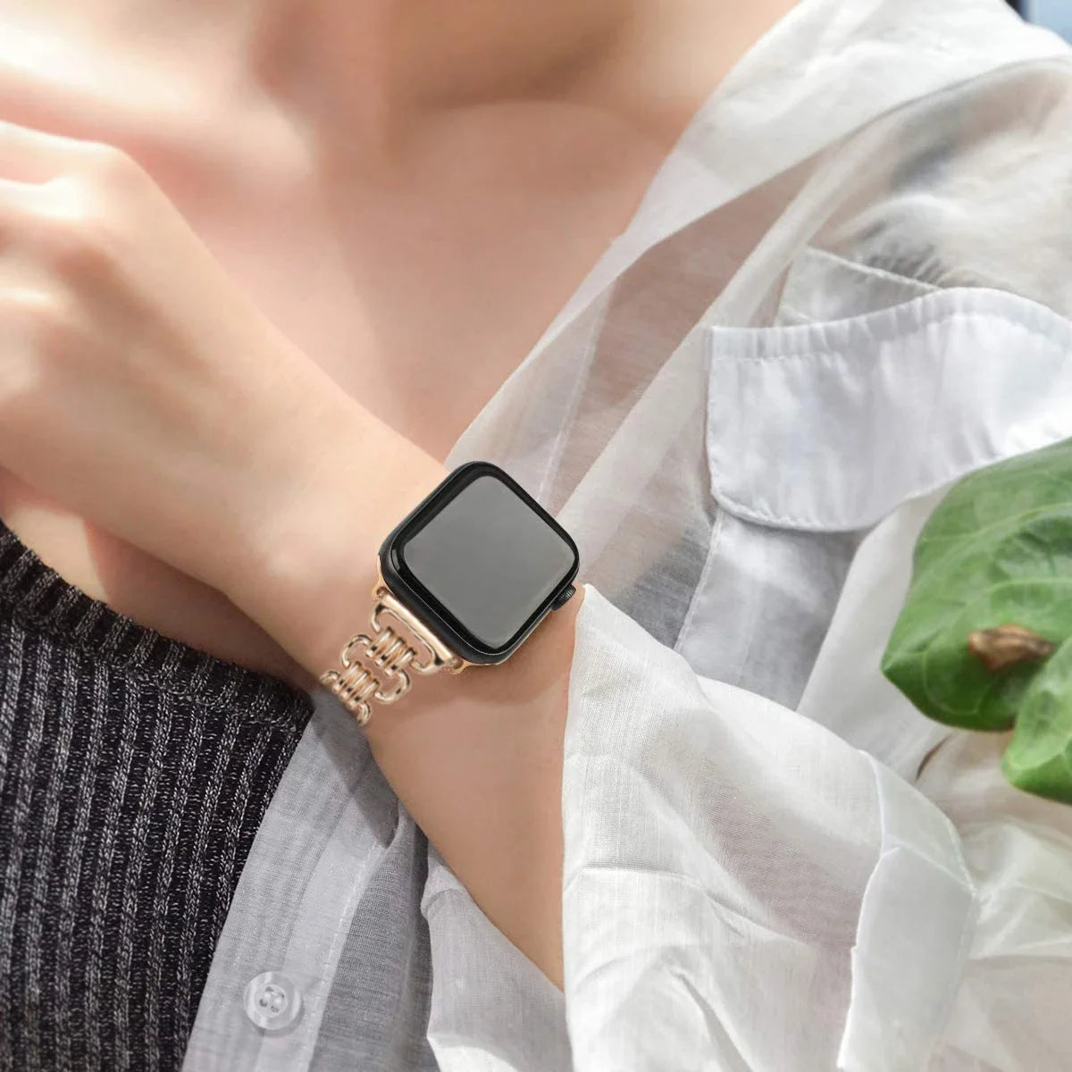 Metal chain bracelet worn on a wrist for Apple Watch
