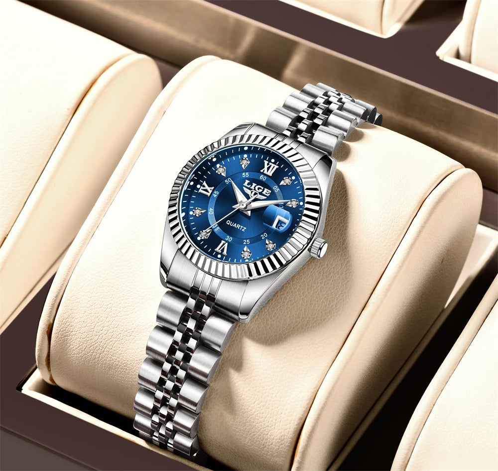 Women's 27mm Fluted Bezel Quartz Date Watch — Silver Tone / Blue Dial