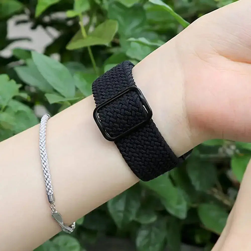 Black braided nylon Google Pixel Watch loop worn on wrist