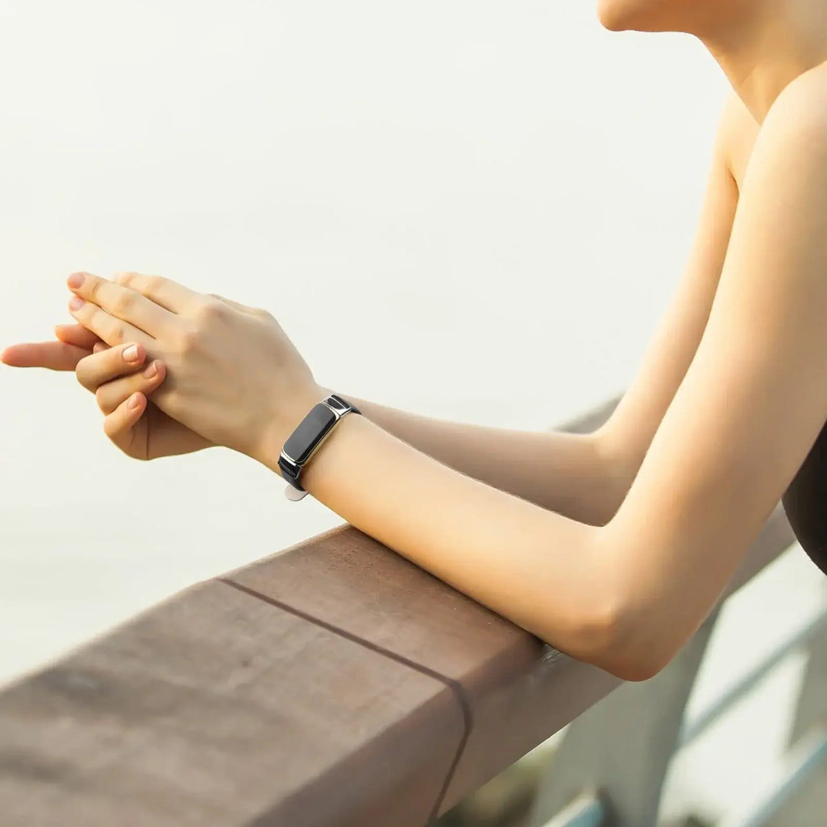 Fitbit Luxe Leather Band with Floral & Glitter Options - Black band worn on wrist