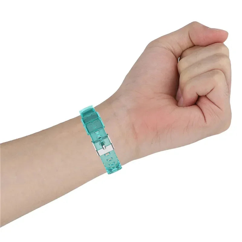 Fitbit Luxe Transparent Case-and-Band Strap - Transparent teal band worn on wrist