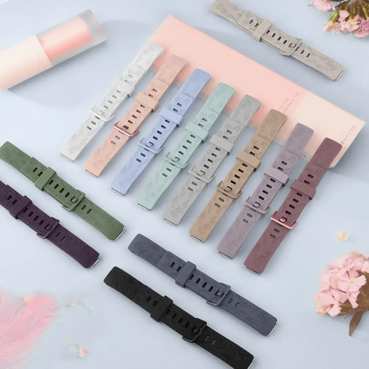 Fitbit Inspire 3 Floral-Engraved Silicone Band - Floral straps laid flat