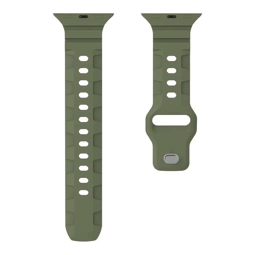 Olive green ribbed silicone Apple Watch strap laid flat, showing the fastening holes.