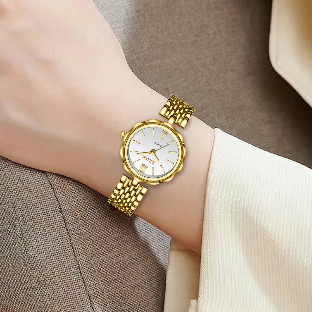 Women's Roman Dial Link Bracelet Quartz Watch — Gold-tone watch worn on wrist — BandsCo Straps
