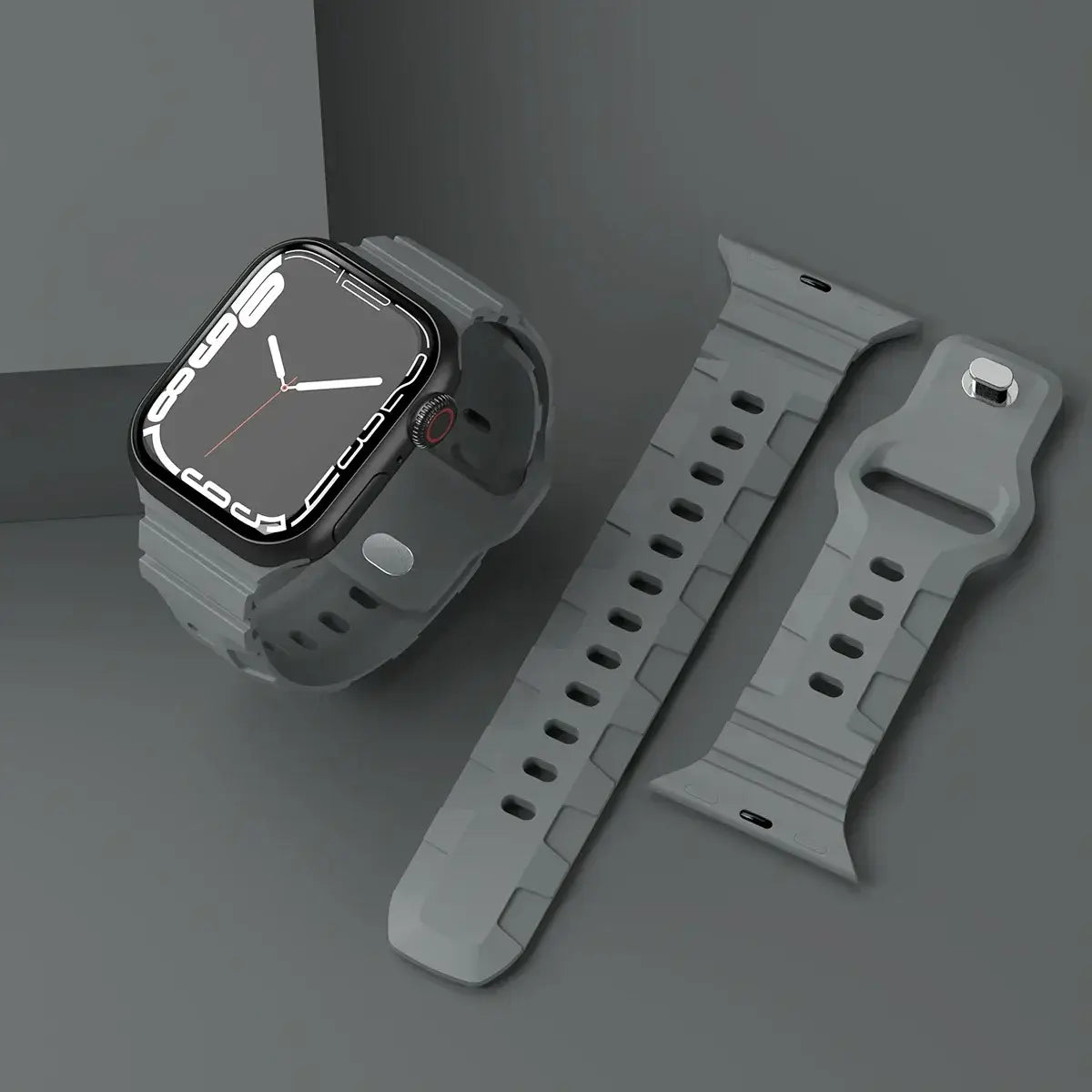 Gray ribbed silicone Apple Watch band with pin fastening.
