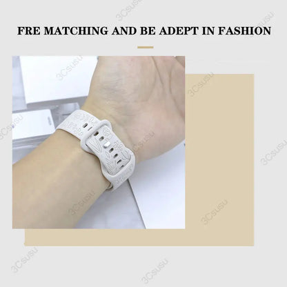Garmin Rose Engraved Silicone Band in white worn on a wrist