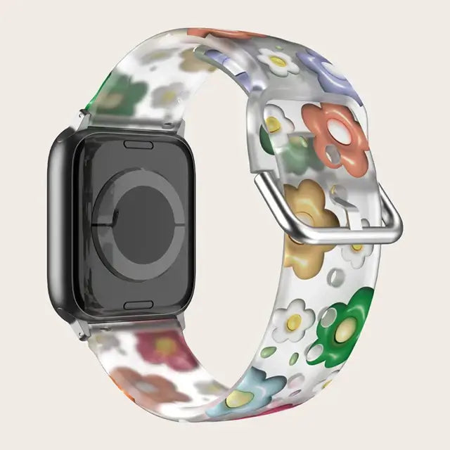 Multicolor Daisy Apple Watch band with buckle and adjustment holes.