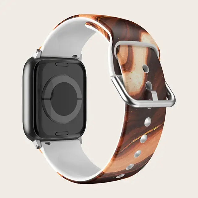 Brown Marble Apple Watch band with buckle and adjustment holes.
