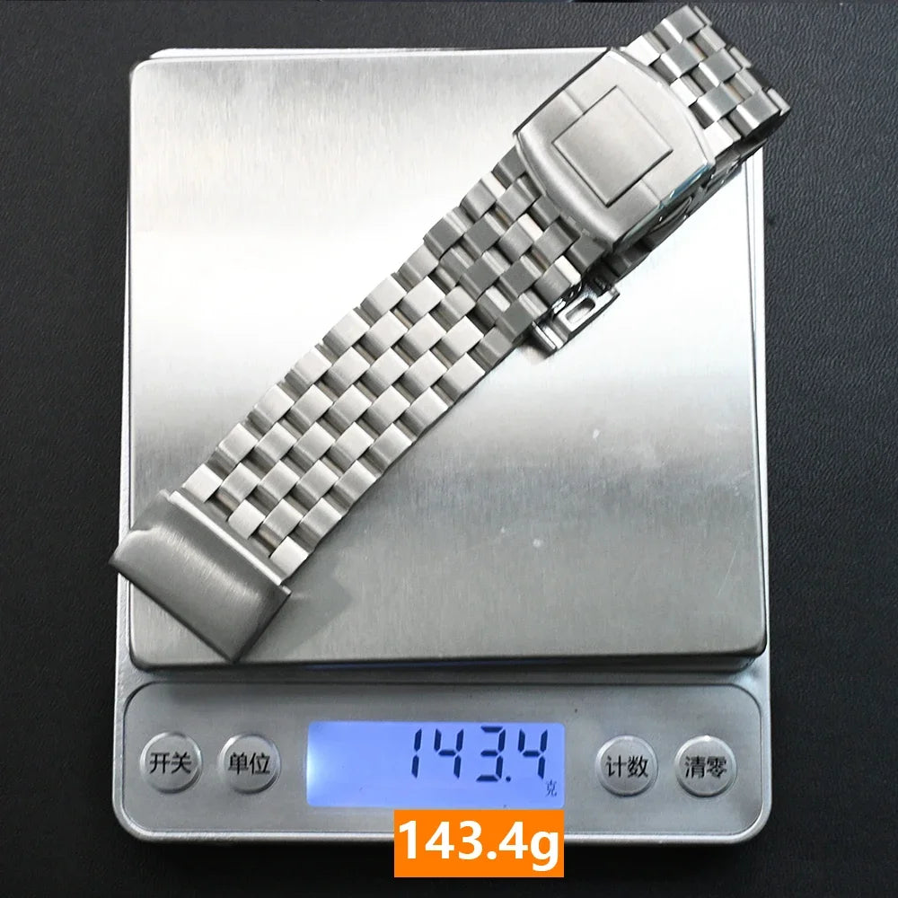 Garmin Stainless Steel Checker-Link Band silver bracelet on a digital scale