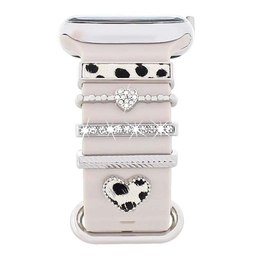 Decorative metal charms on an Apple Watch band, adding elegance and personality to your smartwatch.