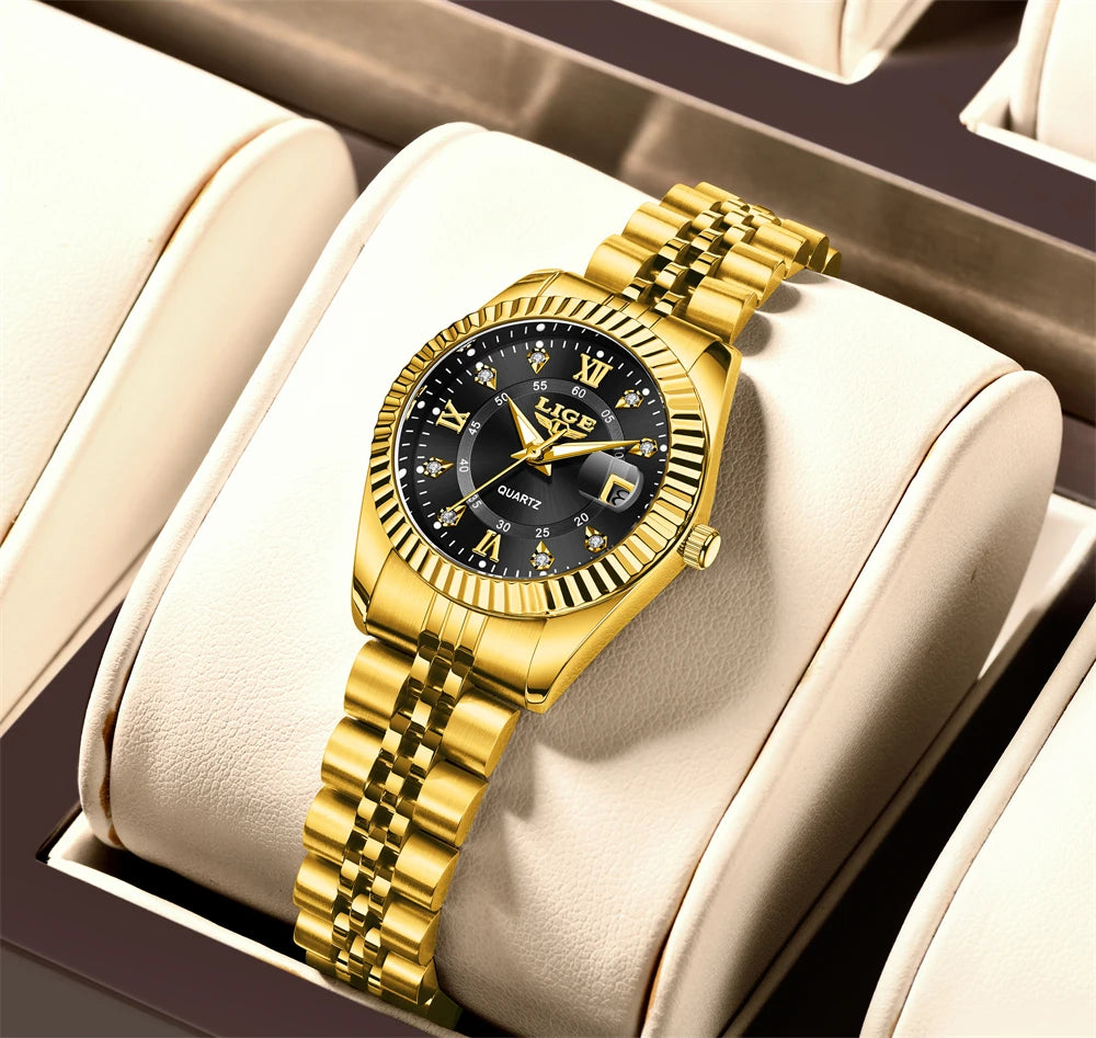 Women's 27mm Fluted Bezel Quartz Date Watch — Gold Tone / Black Dial