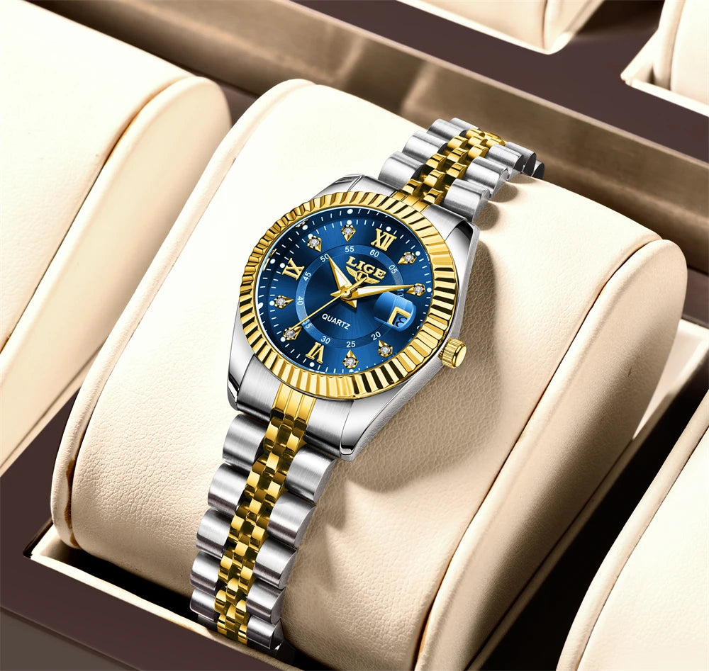 Women's 27mm Fluted Bezel Quartz Date Watch — Two Tone / Blue Dial