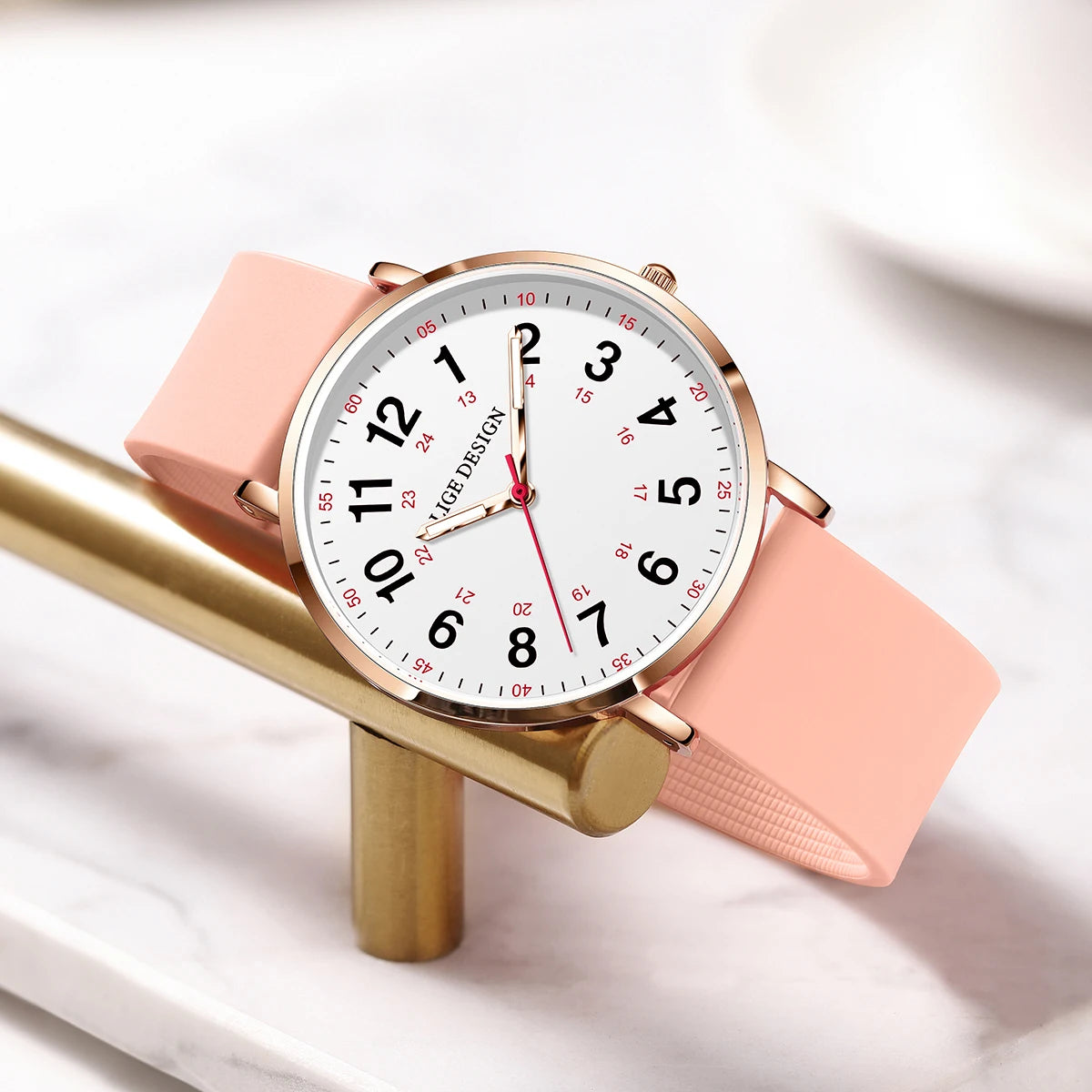 Women's Arabic Numeral Silicone Quartz Watch — Pink watch angled view — BandsCo Straps