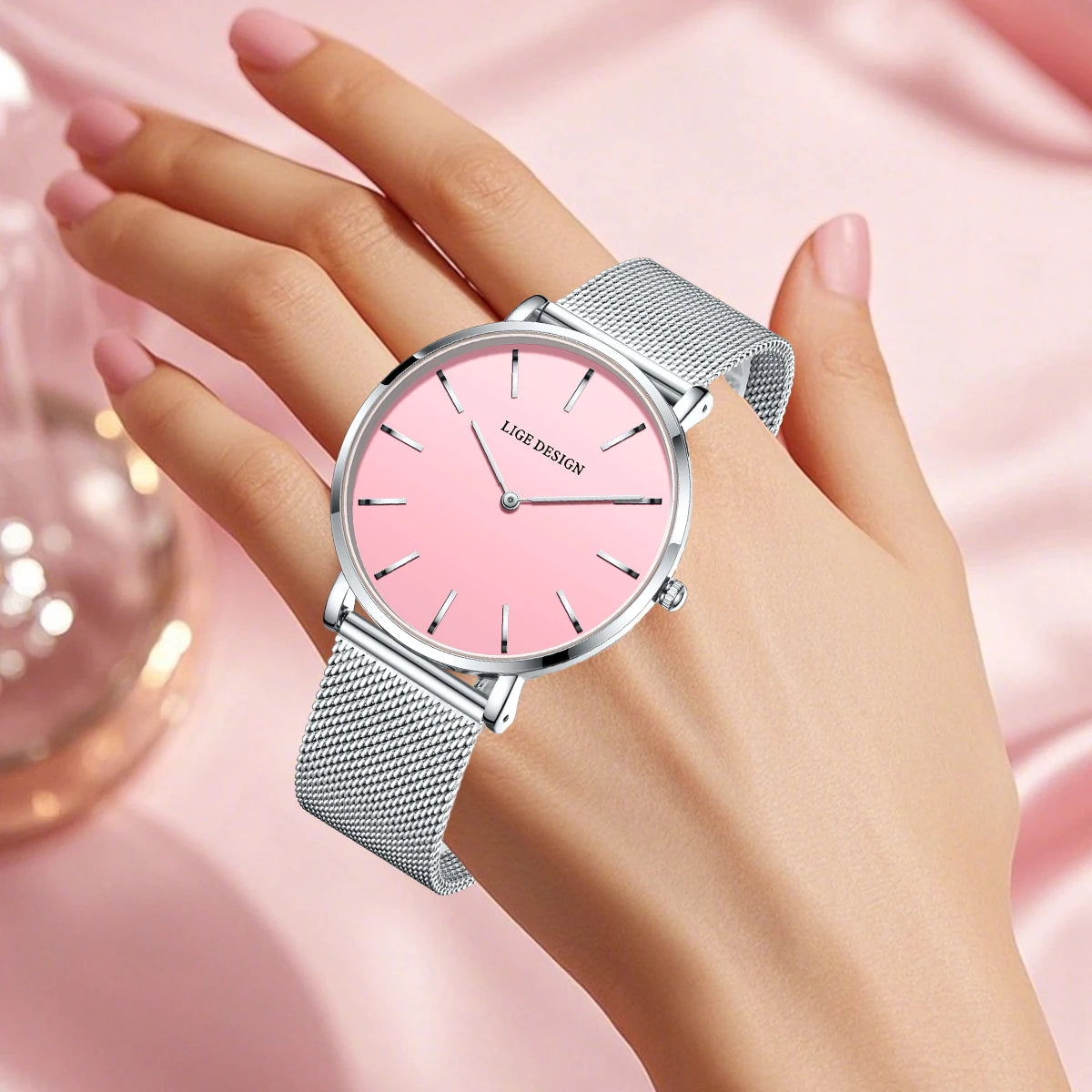 Women's Minimalist Quartz Watch with Stainless Steel Mesh Band — Pink dial watch shown on wrist