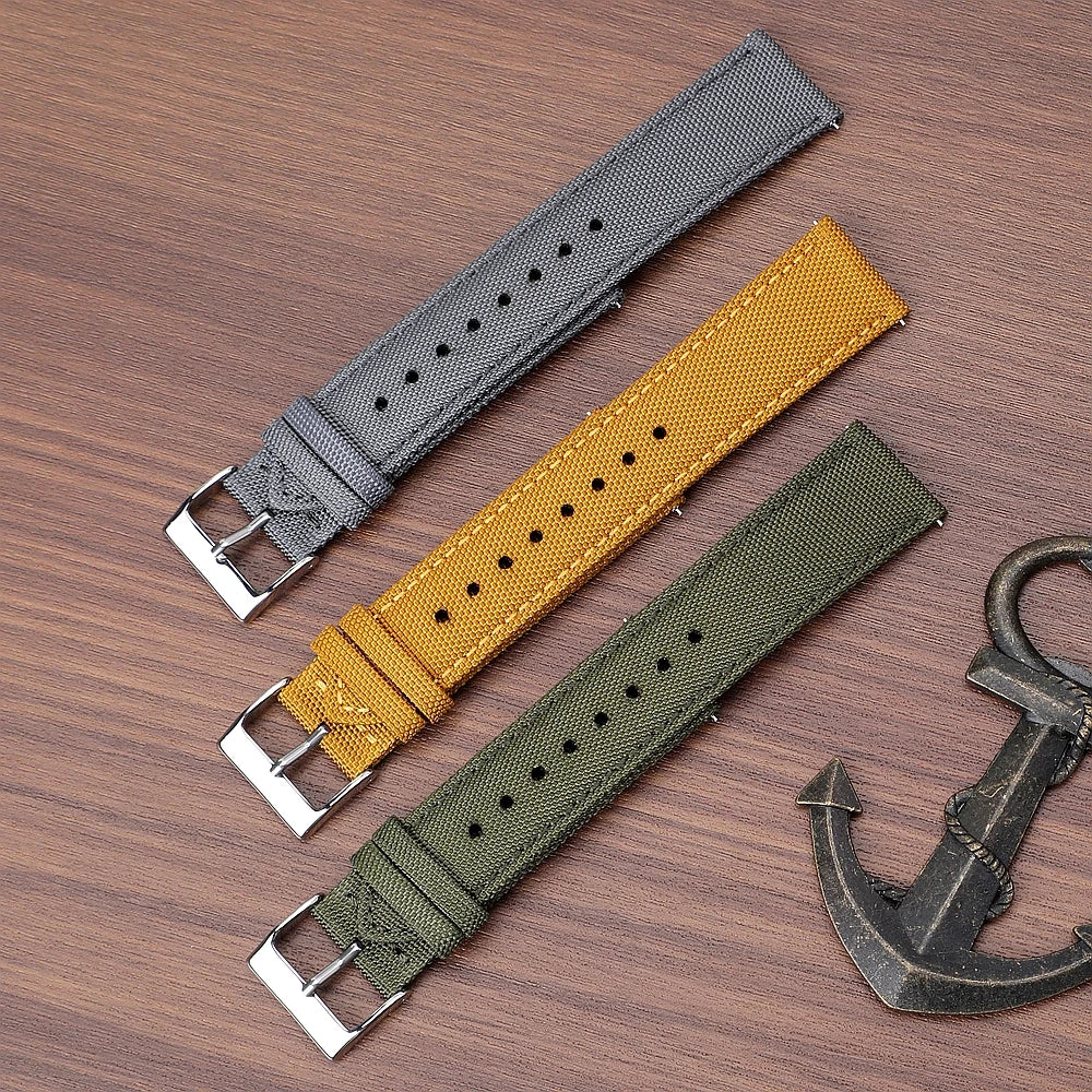 OnePlus Smartwatch Nylon Quick Release Sport Watch Band Men Women - gray, yellow, and green straps on a wooden surface.