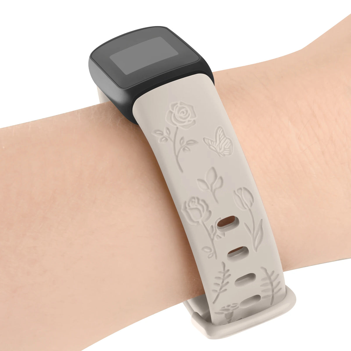 Fitbit Luxe Floral-Engraved TPU Band - Cream floral strap worn on wrist