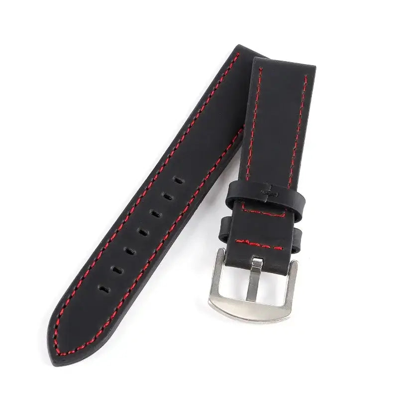 Black leather strap with red stitching and silver-tone buckle