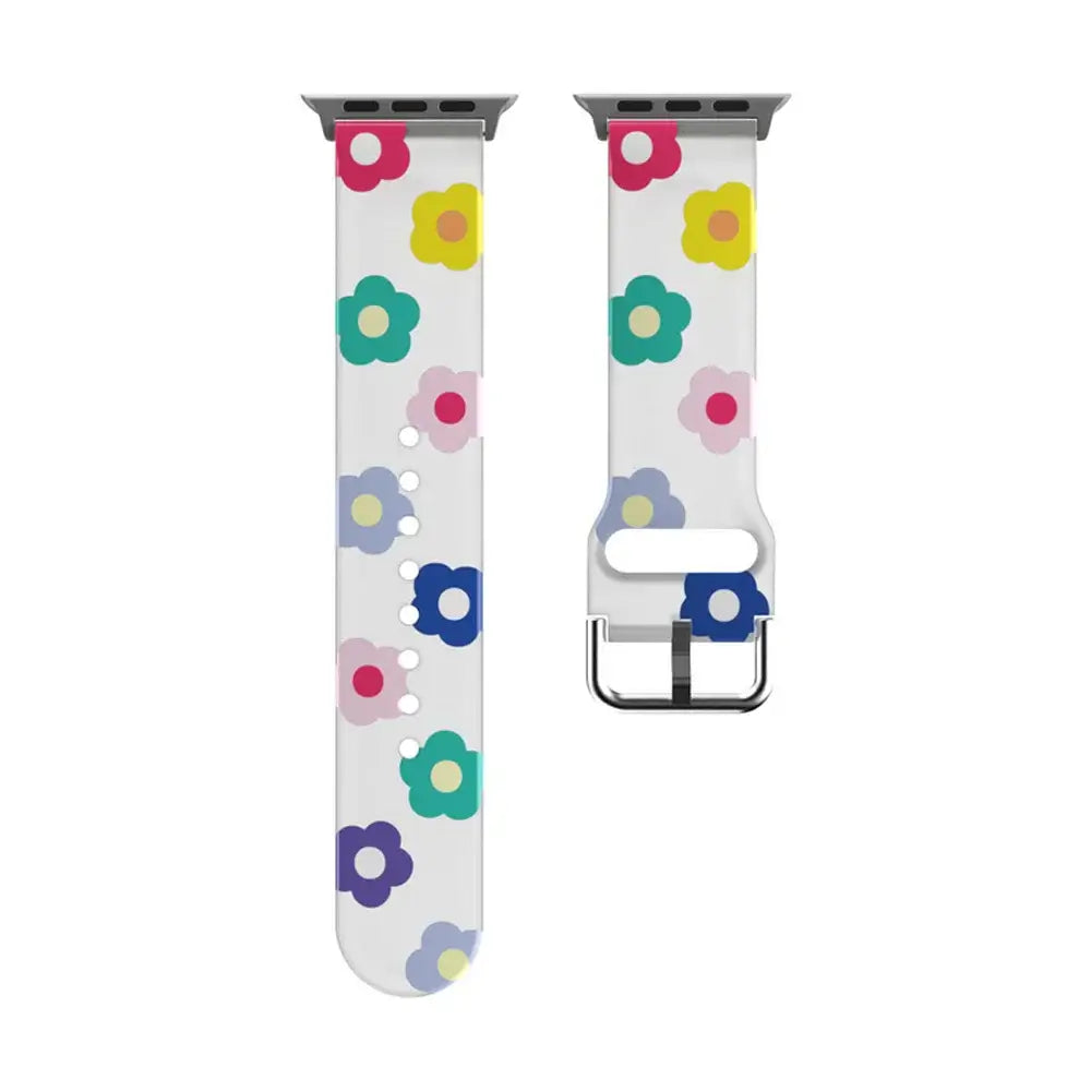 Clear floral Apple Watch strap laid flat.