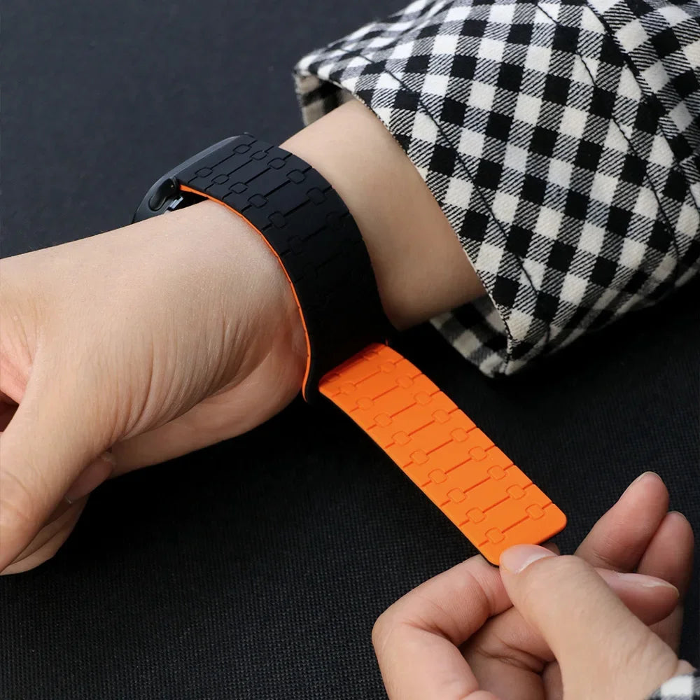 Samsung Galaxy Silicone Link Watch Band – Magnetic for Ultra/Ultra2/Watch8/Watch8 Classic/Watch9 being adjusted on wrist.