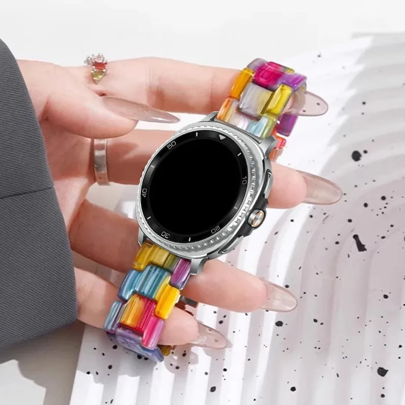 Samsung Galaxy Resin Link Watch Band - Tortoise Women Watch8/Watch8 Classic/Watch9 Ultra/Ultra2 on a hand with stylish nails.