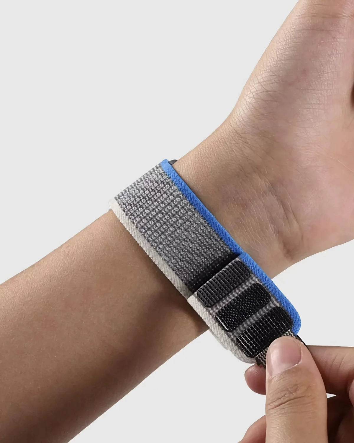 Garmin QuickFit Woven Nylon Trail Loop Band gray and blue loop closure shown on a wrist