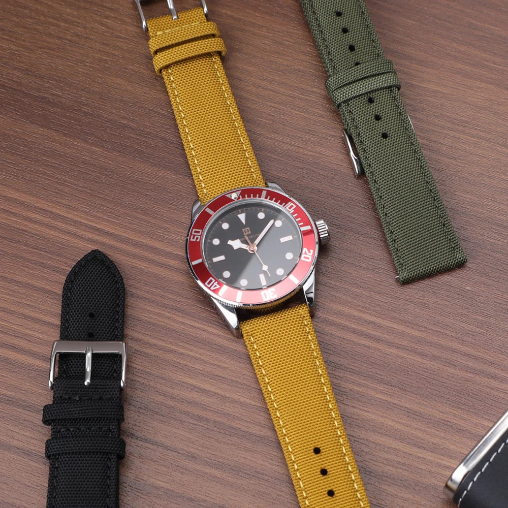 Polar Sailcloth Nylon Watch Band with Pin Buckle — Mustard strap shown on a watch