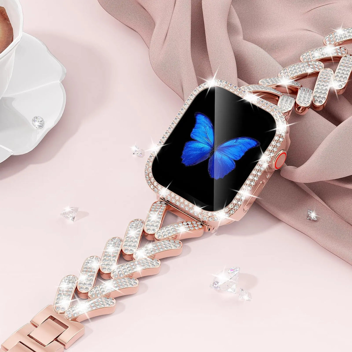 Rose gold leaf-link bracelet displayed on a pink surface for Apple Watch