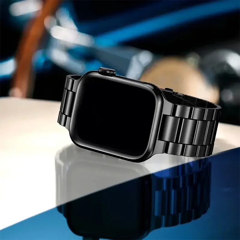 Black wide-link Apple Watch bracelet on display
